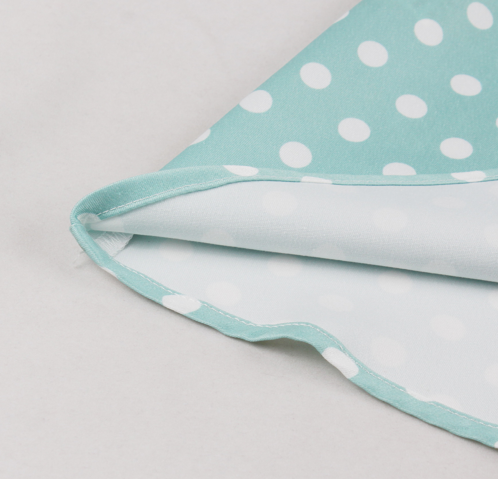 Vintage style, Green with white polka dots, Short sleeves, V-neckline, White lace trim, Chest bow accent, Cinched waist belt, A-line skirt, Lightweight fabric, Comfortable fit #N23827