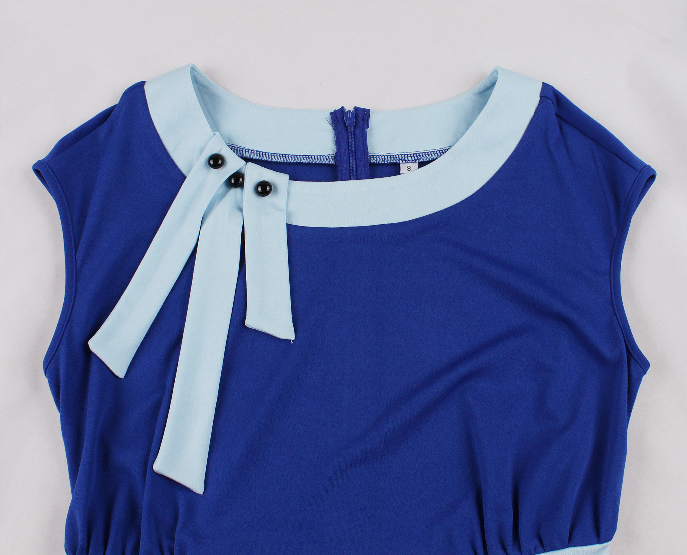 vintage style, light blue trim, side bow design, sleeveless, waist belt, flared A-line skirt, matching headband, elegant silhouette, round neck, sweet and playful #N23818