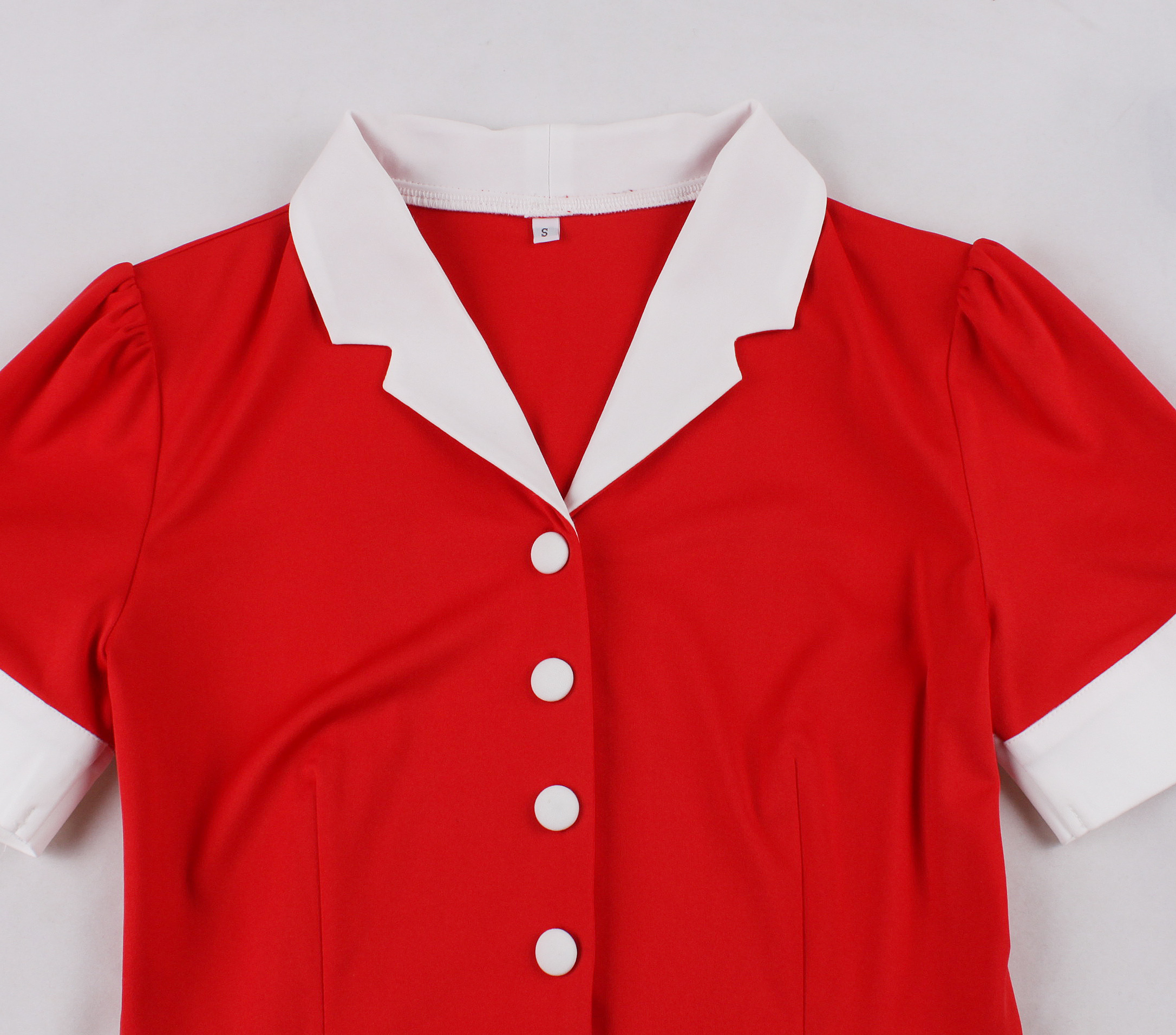 Strawberry print, Polka dot pattern, Red ribbon waist tie, Heart-shaped buttons, Classic collar, Short puffed sleeves, White lace cuffs, Flared A-line skirt, Vintage mini dress, Sweet and playful style #N23825