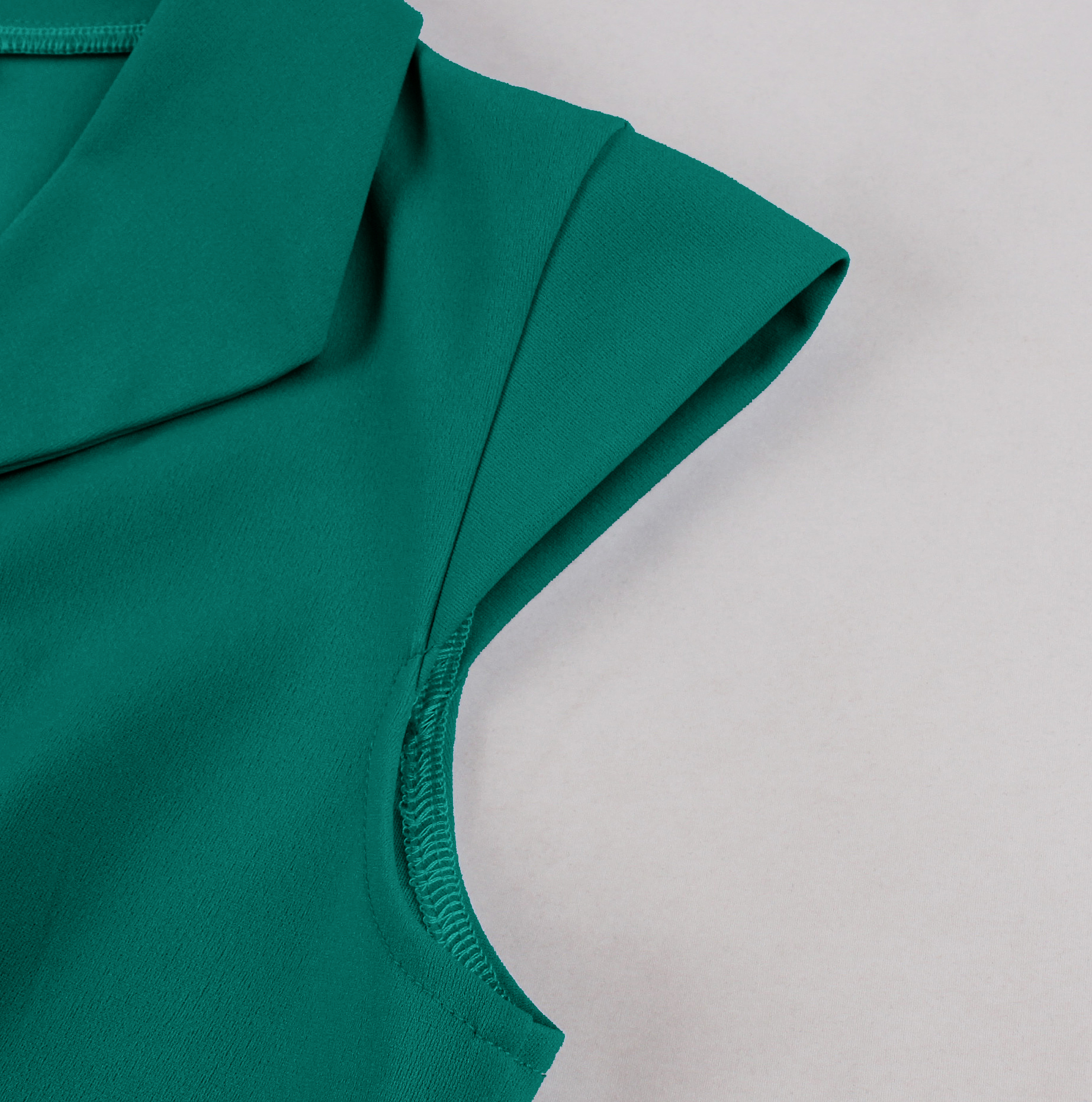 Vintage style, Teal green color, Red waist belt, A-line skirt, Four front buttons, Sleeveless design, Lightweight fabric, 1960s fashion, Casual retro dress, Flowy silhouette #N23820